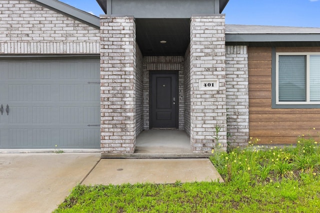 property entrance featuring a garage