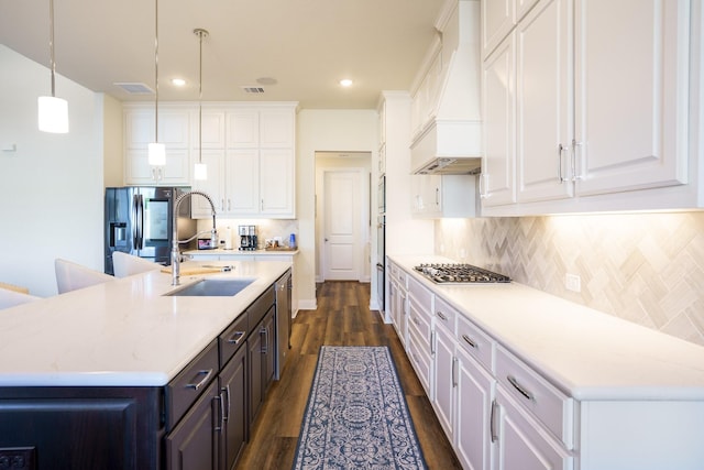 915 Blueberry Way, Northlake, TX 76247 - kitchen featuring a sink, white cabinetry, light countertops, and premium range hood