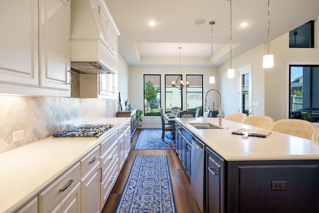 915 Blueberry Way, Northlake, TX 76247 - kitchen with custom exhaust hood, dark wood finished floors, a sink, light countertops, and white cabinets