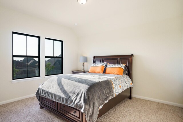 915 Blueberry Way, Northlake, TX 76247 - bedroom with baseboards, light carpet, and lofted ceiling