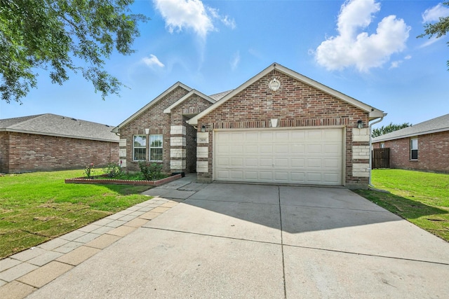 3105 Lipizzan Dr, Denton, TX 76210 - traditional-style house with brick siding, a front lawn, and concrete driveway