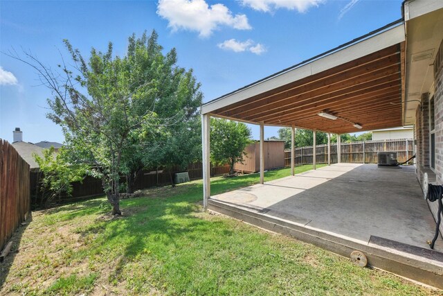 3105 Lipizzan Dr, Denton, TX 76210 - view of yard featuring a patio area and central AC