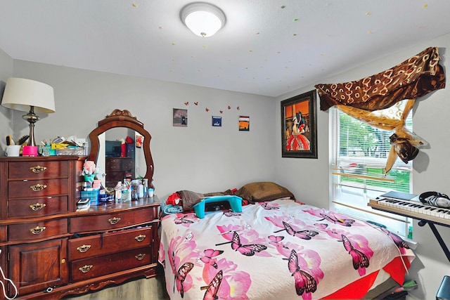 600 Saint Luke St, Terrell, TX 75160 - bedroom featuring wood finished floors