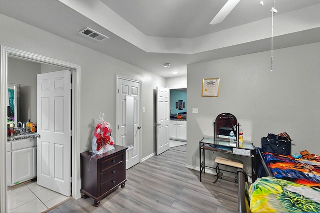 600 Saint Luke St, Terrell, TX 75160 - bedroom with recessed lighting, light wood finished floors, connected bathroom, and visible vents