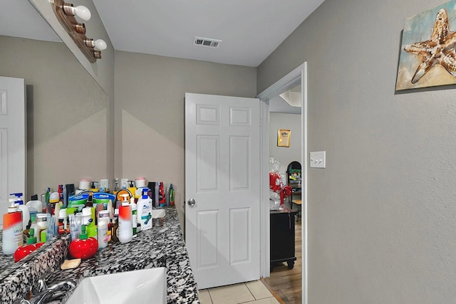 600 Saint Luke St, Terrell, TX 75160 - bathroom with a sink, tile patterned flooring, and visible vents