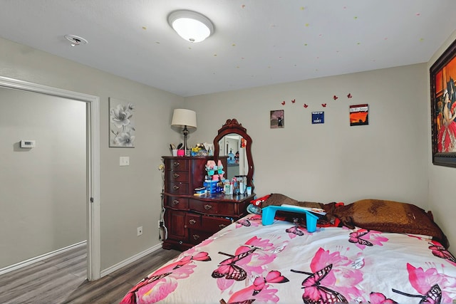600 Saint Luke St, Terrell, TX 75160 - bedroom featuring wood finished floors and baseboards