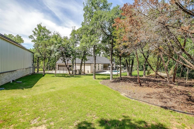 1008 Trinity Oaks Rd, Weatherford, TX 76087 - view of grassy yard with a garage