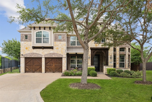 500 Denton Creek Dr, Mckinney, TX 75072 - view of front of house featuring an attached garage, driveway, and stone siding