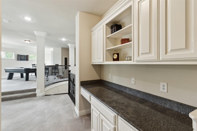 500 Denton Creek Dr, Mckinney, TX 75072 - kitchen with ornate columns, light carpet, recessed lighting, open shelves, and baseboards