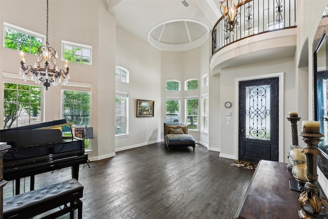 500 Denton Creek Dr, Mckinney, TX 75072 - entrance foyer featuring a chandelier, a towering ceiling, wood finished floors, and baseboards