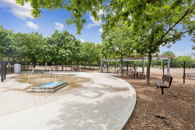 500 Denton Creek Dr, Mckinney, TX 75072 - view of property's community featuring fence and a pergola