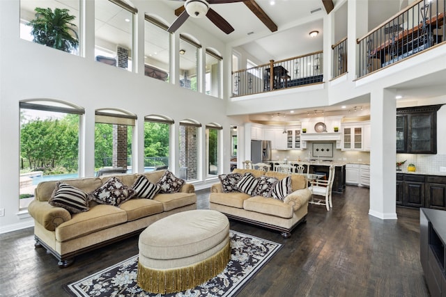 500 Denton Creek Dr, Mckinney, TX 75072 - living area featuring a ceiling fan, dark wood-type flooring, plenty of natural light, and a high ceiling