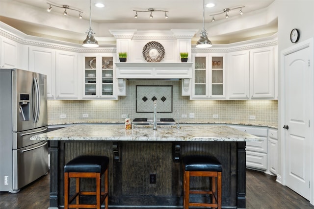 500 Denton Creek Dr, Mckinney, TX 75072 - kitchen featuring stainless steel refrigerator with ice dispenser, white cabinets, glass insert cabinets, and tasteful backsplash