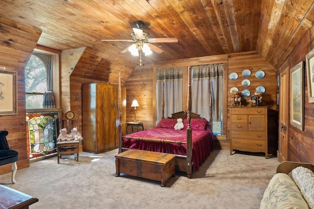 carpeted bedroom with wooden ceiling, wood walls, and lofted ceiling