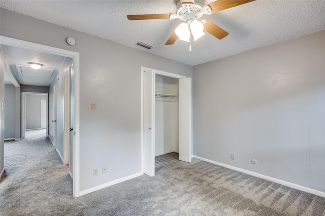 2105 Warnford Pl, Arlington, TX 76015 - unfurnished bedroom featuring a closet, attic access, visible vents, carpet floors, and baseboards