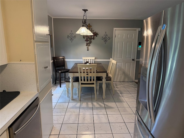 1141 Bowie St, Sulphur Springs, TX 75482 - dining area with light marble finish floors and ornamental molding