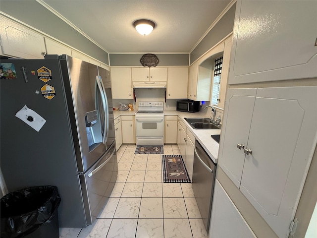 1141 Bowie St, Sulphur Springs, TX 75482 - kitchen featuring stainless steel appliances, a sink, crown molding, light countertops, and light marble finish flooring