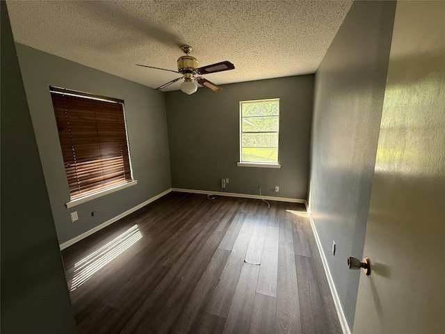 1141 Bowie St, Sulphur Springs, TX 75482 - spare room featuring wood finished floors, ceiling fan, a textured ceiling, and baseboards