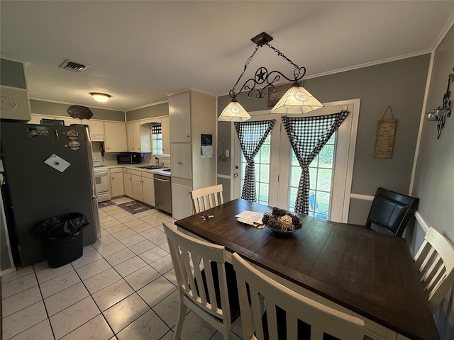 1141 Bowie St, Sulphur Springs, TX 75482 - dining room with crown molding