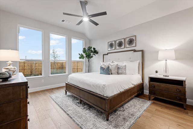 913 Beall St, Denton, TX 76207 - bedroom with ceiling fan, baseboards, visible vents, and light wood-style floors