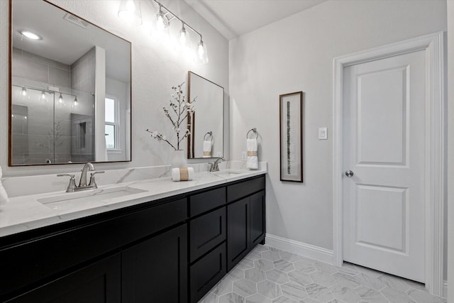 913 Beall St, Denton, TX 76207 - bathroom with double vanity, a sink, visible vents, tile patterned flooring, and a shower stall
