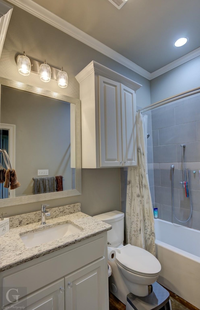 bathroom with crown molding, toilet, shower / bath combination with curtain, and vanity