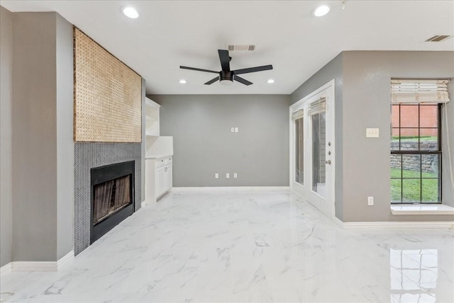 unfurnished living room featuring visible vents, recessed lighting, a fireplace, ceiling fan, and baseboards