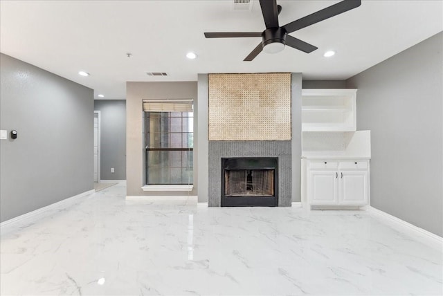 unfurnished living room featuring visible vents, a fireplace, ceiling fan, and recessed lighting
