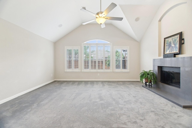 4118 Armistice Dr, Frisco, TX 75034 - unfurnished living room featuring carpet, vaulted ceiling, ceiling fan, and a glass covered fireplace