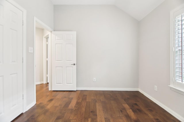 4118 Armistice Dr, Frisco, TX 75034 - unfurnished room featuring lofted ceiling, baseboards, and dark wood-type flooring