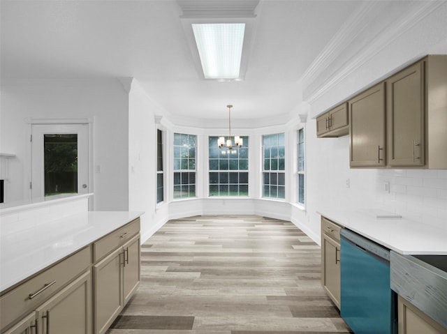 kitchen with dishwasher, a wealth of natural light, and crown molding