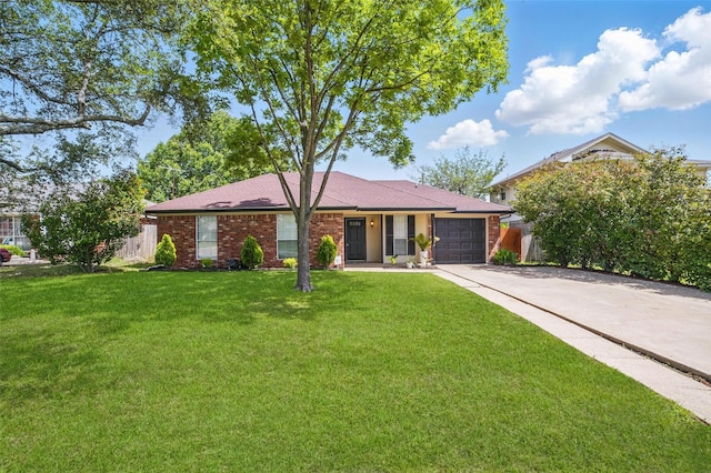 704 Loganwood Dr, Royse City, TX 75189 - ranch-style house with concrete driveway and a garage