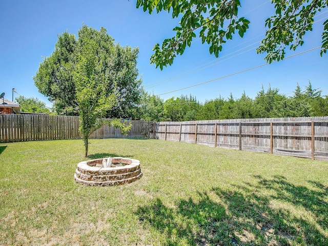 704 Loganwood Dr, Royse City, TX 75189 - view of yard featuring an outdoor fire pit