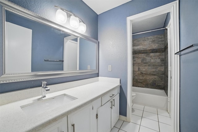 704 Loganwood Dr, Royse City, TX 75189 - full bathroom with toilet, tile patterned flooring, vanity, a textured wall, and baseboards