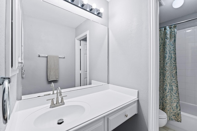 full bath featuring toilet, vanity, and shower / bath combo with shower curtain