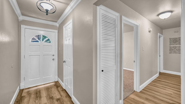 521 S Kate St, White Settlement, TX 76108 - entrance foyer with light wood finished floors, crown molding, and baseboards