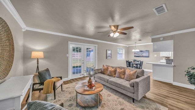 521 S Kate St, White Settlement, TX 76108 - living area with french doors, baseboards, ceiling fan, visible vents, and wood finished floors