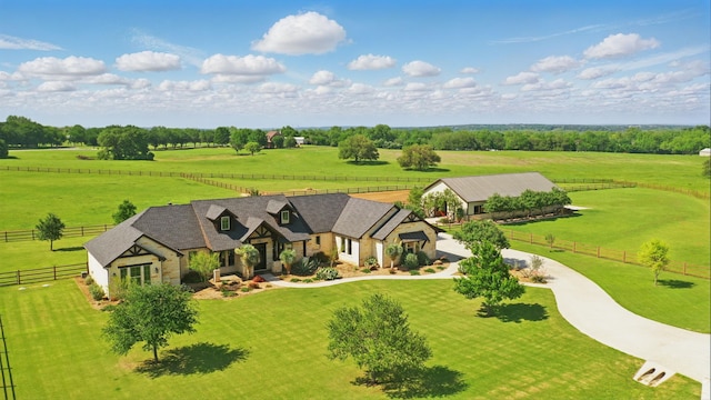 birds eye view of property featuring a rural view