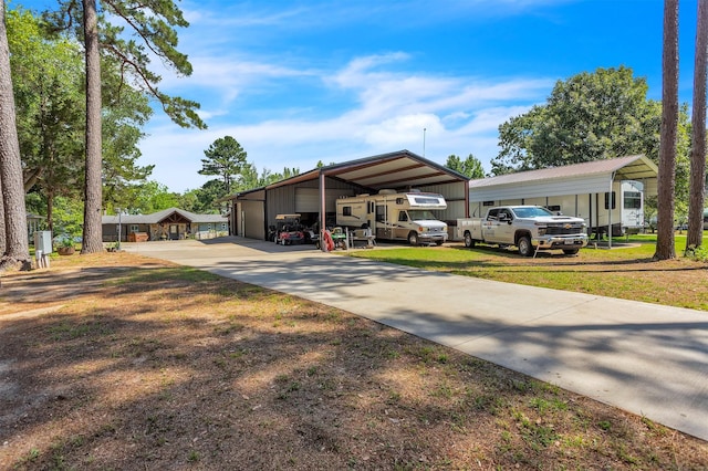 2204 County Road 1570, Alba, TX 75410 - view of parking with a detached garage