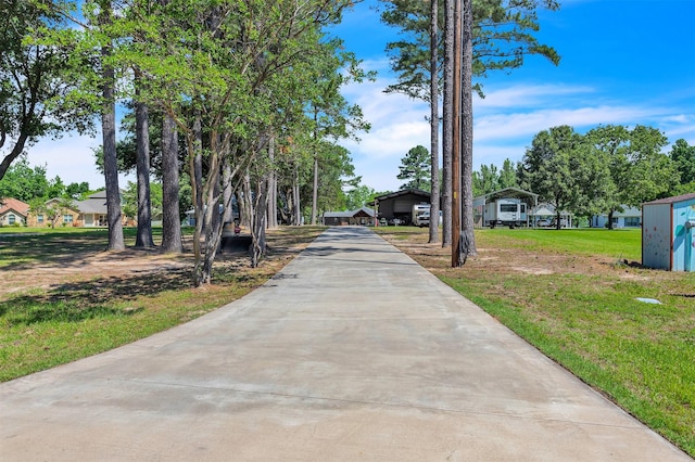 2204 County Road 1570, Alba, TX 75410 - view of property's community featuring driveway and a lawn