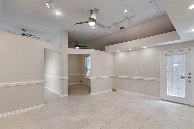 1424 Indian Spgs, Carrollton, TX 75007 - empty room with attic access, visible vents, baseboards, and a ceiling fan