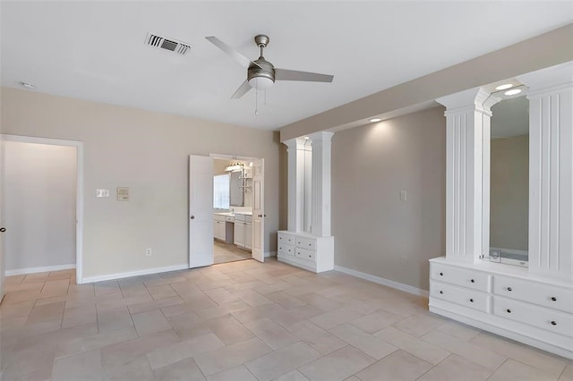 1424 Indian Spgs, Carrollton, TX 75007 - unfurnished bedroom featuring light tile patterned flooring, baseboards, ornate columns, and visible vents