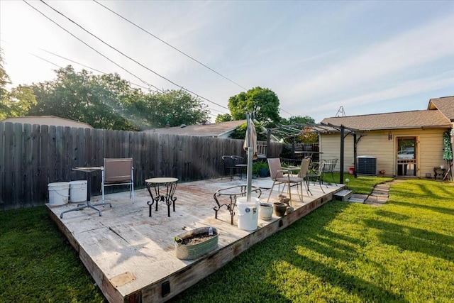 view of patio with cooling unit and a fenced backyard
