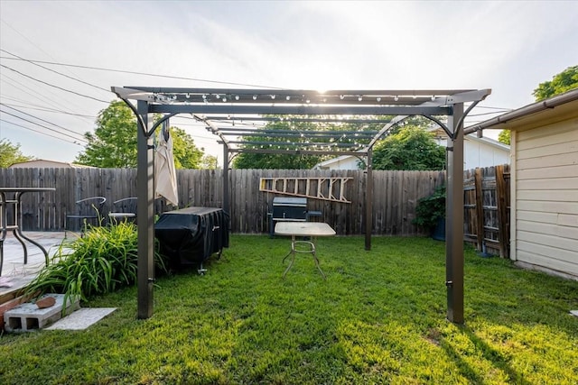 view of yard with a pergola and a fenced backyard