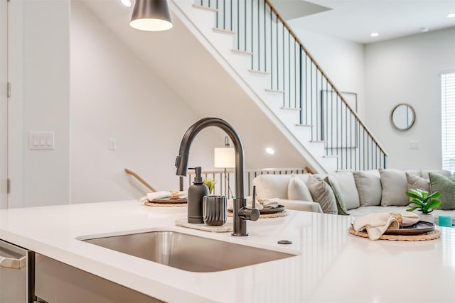 125 Vista Ln, Arlington, TX 76013 - details with light countertops, recessed lighting, and a sink