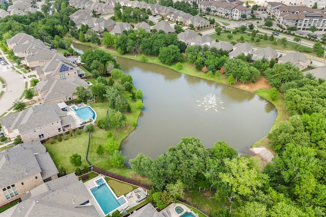 birds eye view of property featuring a water view and a residential view