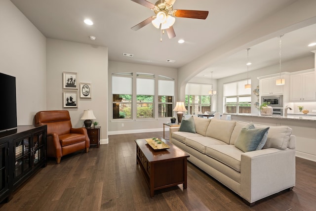 living area with baseboards, dark wood-style flooring, recessed lighting, and ceiling fan