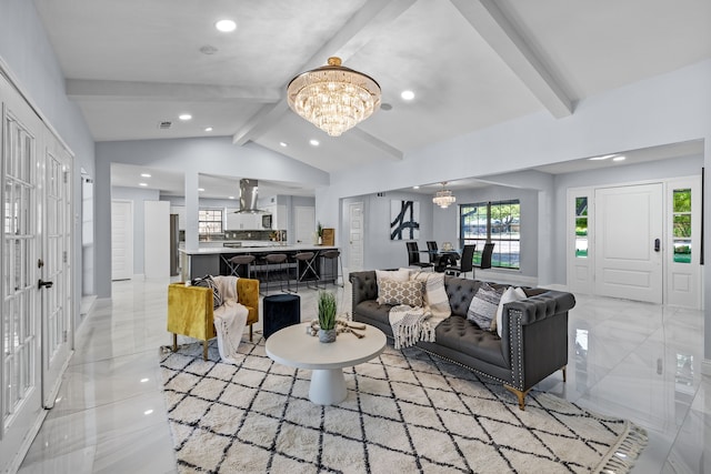 living area featuring a chandelier, lofted ceiling with beams, and recessed lighting