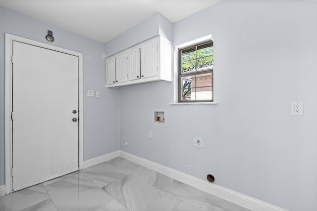 washroom featuring cabinet space, washer hookup, hookup for an electric dryer, baseboards, and marble finish floor