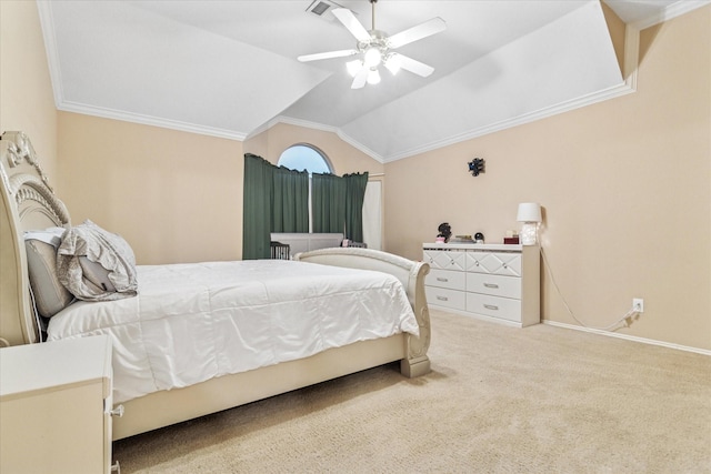 bedroom with a ceiling fan, baseboards, crown molding, vaulted ceiling, and carpet floors